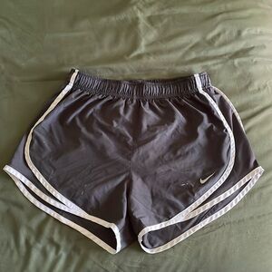 Gray women’s dry-fit Nike running shorts